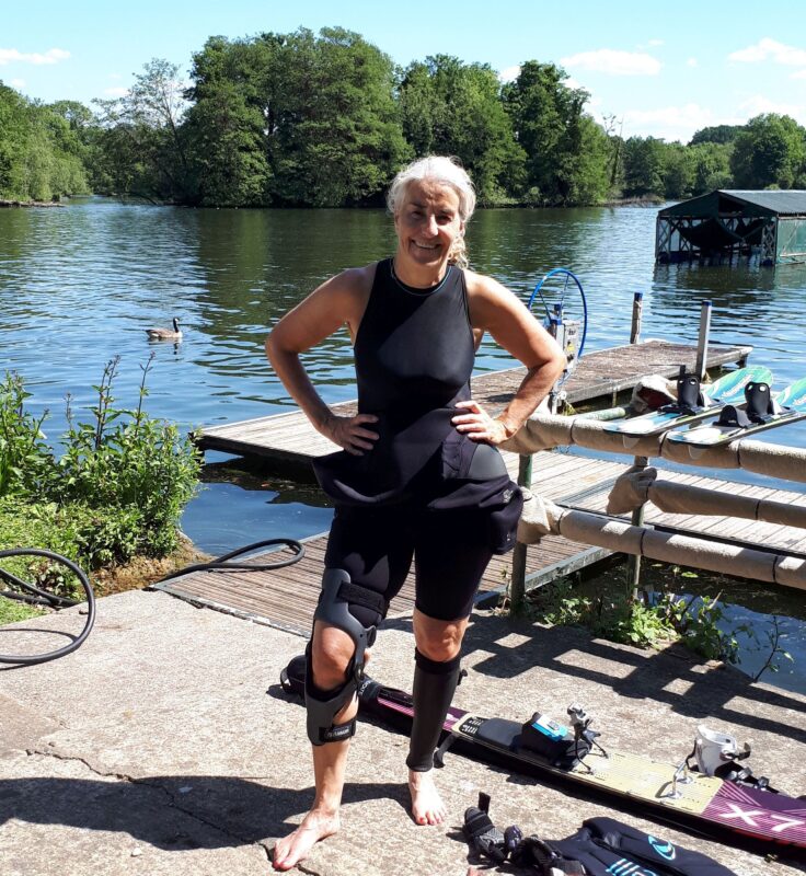 Water ski with a knee brace